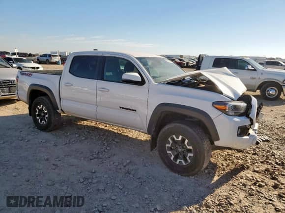 2023 Toyota Tacoma SR with VIN 3TYCZ5AN5PT128577, listed as a Copart auction lot 81493375 with 37,223 mi miles and Salvage title. Bid and sale history available at DreamBid. Image 4.