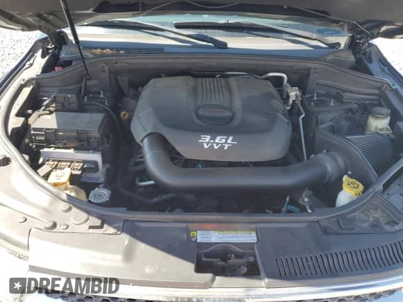 2013 Dodge Durango SXT z VIN 1C4RDHAG6DC579862, wystawiony jako Copart lot #83901405 z przebiegiem 180 354 mil mil oraz Szkoda całkowita • Salvage title. Historia ofert i sprzedaży dostępna na DreamBid. Obrazek 12.