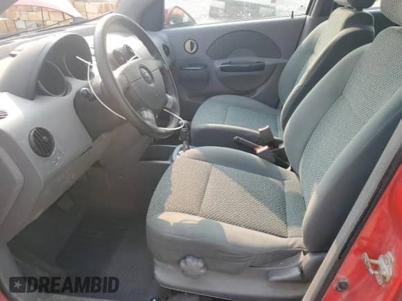 2005 Chevrolet Aveo LT с VIN KL1TG62635B309719, выставлен на аукционе Copart как лот 71490495 с пробегом 143 780 миль миль и Списание • Salvage title. История ставок и продаж доступна на DreamBid. Изображение 7.