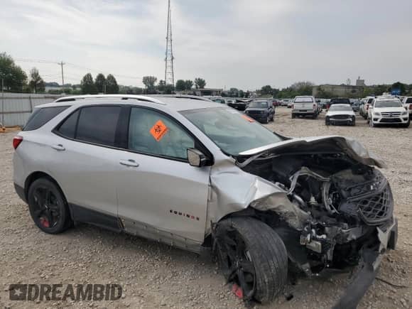 2021 Chevrolet Equinox Premier with VIN 2GNAXXEV3M6165784, listed as a Copart auction lot 67828294 with Not provided miles and Salvage title. Bid and sale history available at DreamBid. Image 4.