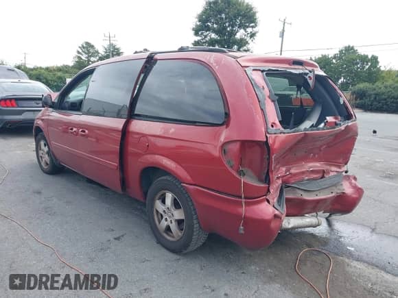 2007 Dodge Grand Caravan SXT with VIN 2D8GP44L77R339670, listed as a IAAI auction lot 43427577 with 200,899 mi miles and . Bid and sale history available at DreamBid. Image 3.