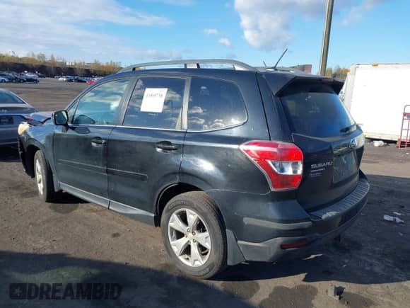 2014 Subaru Forester Touring with VIN JF2SJAMC8EH406036, listed as a IAAI auction lot 43505738 with 206,165 mi miles and . Bid and sale history available at DreamBid. Image 3.