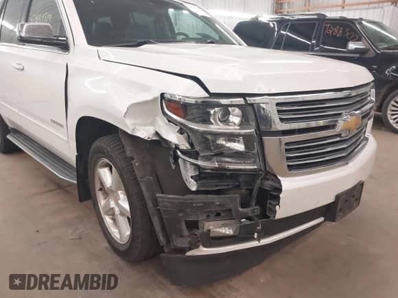 2016 Chevrolet Tahoe LTZ with VIN 1GNSKCKC8GR273955, listed as a IAAI auction lot 42899509 with 163,672 mi miles and . Bid and sale history available at DreamBid. Image 6.