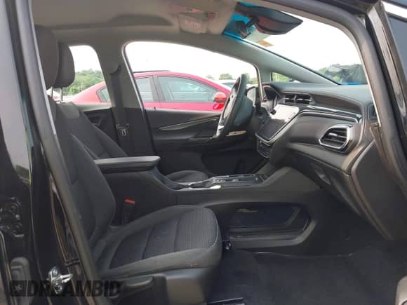 2023 Chevrolet Bolt EV 1LT with VIN 1G1FW6S0XP4140142, listed as a IAAI auction lot 42353165 with 30,244 mi miles and . Bid and sale history available at DreamBid. Image 5.