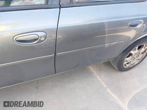 2005 Dodge Neon SXT with VIN 1B3ES56C65D130333, listed as a IAAI auction lot 43243585 with 209,552 mi miles and . Bid and sale history available at DreamBid. Image 6.