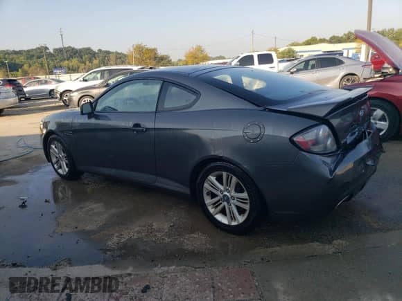 2007 Hyundai Tiburon GS с VIN KMHHM66D87U238729, выставлен на аукционе Copart как лот 68836234 с пробегом 185 898 миль миль и На запчасти • Non repairable. История ставок и продаж доступна на DreamBid. Изображение 2.