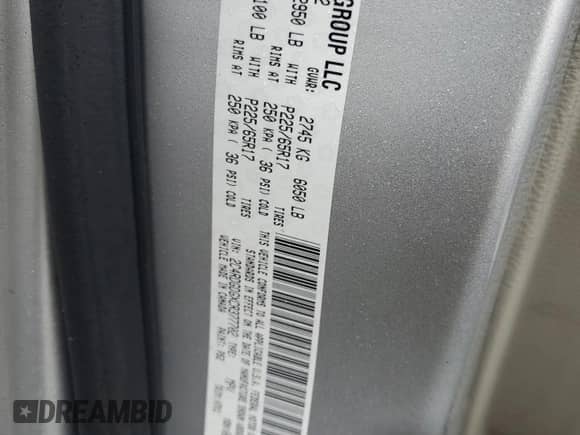 2012 Dodge Grand Caravan Crew with VIN 2C4RDGDGXCR377702, listed as a Copart auction lot 71827965 with 221,594 mi miles and Salvage title. Bid and sale history available at DreamBid. Image 13.