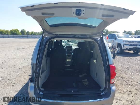 2015 Dodge Grand Caravan SE Plus with VIN 2C4RDGBGXFR540615, listed as a IAAI auction lot 43135303 with 77,597 mi miles and . Bid and sale history available at DreamBid. Image 17.