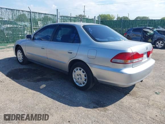 2001 Honda Accord LX with VIN JHMCG56431C014909, listed as a IAAI auction lot 43228547 with 307,350 mi miles and . Bid and sale history available at DreamBid. Image 3.
