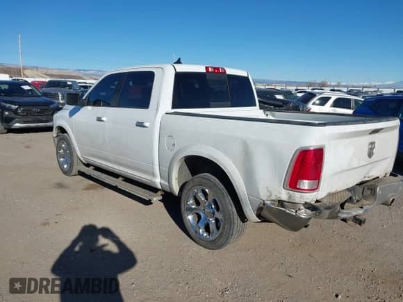 2018 Ram 1500 Laramie with VIN 1C6RR7NT5JS186138, listed as a IAAI auction lot 41387205 with 108,434 mi miles and . Bid and sale history available at DreamBid. Image 3.
