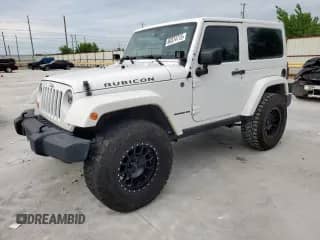 2013 Jeep Wrangler Rubicon 10th Anniversary with VIN 1C4BJWCGXDL550313, listed as a Copart auction lot 60374715 with 122,936 mi miles and Clean title. Bid and sale history available at DreamBid. Image 1.