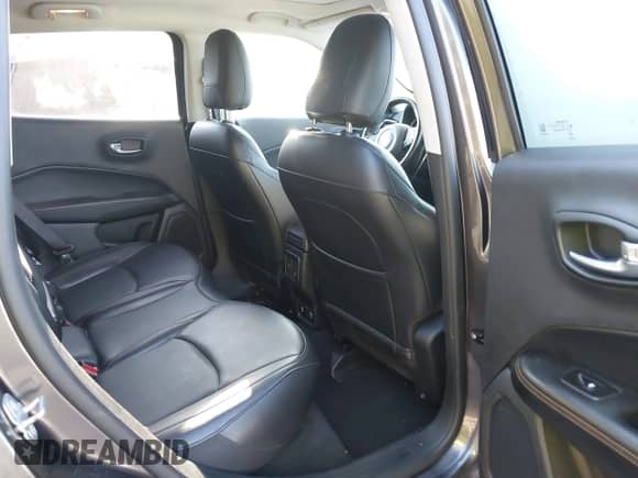 2019 Jeep Compass Limited with VIN 3C4NJDCB3KT842909, listed as a IAAI auction lot 43338860 with 100,667 mi miles and . Bid and sale history available at DreamBid. Image 8.