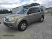 2011 Honda Pilot LX z VIN 5FNYF3H2XBB024268, wystawiony jako Copart lot #81864065 z przebiegiem 243 782 mil mil oraz Czysty tytuł • Clean title. Historia ofert i sprzedaży dostępna na DreamBid. Obrazek 1.