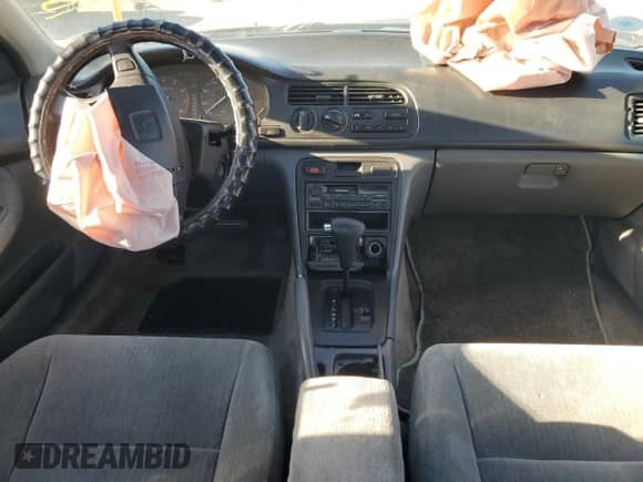 1994 Honda Accord LX с VIN 1HGCD5638RA000515, выставлен на аукционе Copart как лот 70008695 с пробегом 162 009 миль миль и На запчасти • Non repairable. История ставок и продаж доступна на DreamBid. Изображение 8.