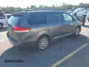 2011 Toyota Sienna LE with VIN 5TDJK3DC5BS019471, listed as a IAAI auction lot 43121145 with 214,140 mi miles and . Bid and sale history available at DreamBid. Image 4.