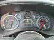 2023 Ram 1500 Big Horn with VIN 1C6SRFMT1PN628076, listed as a Copart auction lot 71742945 with 76,500 mi miles and Salvage title. Bid and sale history available at DreamBid. Image 9.