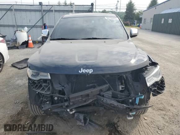 2017 Jeep Grand Cherokee Overland with VIN 1C4RJFCG4HC624457, listed as a Copart auction lot 60759955 with 130,595 mi miles and Salvage title. Bid and sale history available at DreamBid. Image 5.