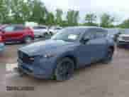 2024 Mazda CX-5 S Preferred z VIN JM3KFBCM1R0396266, wystawiony jako IAAI lot #42542467 z przebiegiem 16 382 mil mil oraz . Historia ofert i sprzedaży dostępna na DreamBid. Obrazek 2.