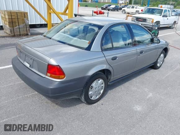 1997 Saturn SL with VIN 1G8ZH5285VZ117635, listed as a IAAI auction lot 42153929 with 193,224 mi miles and . Bid and sale history available at DreamBid. Image 4.