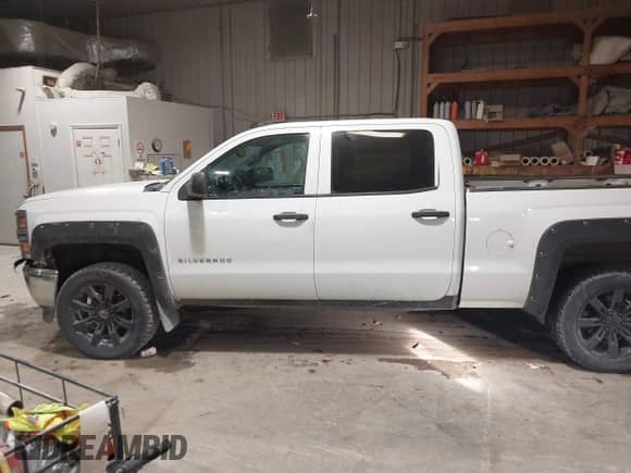 2014 Chevrolet Silverado 1500 LT with VIN 1GCUKREC4EF193227, listed as a IAAI auction lot 41323597 with 189,886 mi miles and . Bid and sale history available at DreamBid. Image 14.