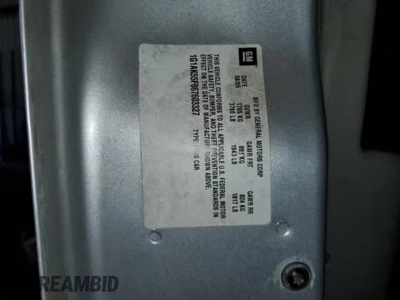 2006 Chevrolet Cobalt LS z VIN 1G1AK55F867603327, wystawiony jako Copart lot #87370595 z przebiegiem 187 099 mil mil oraz Szkoda całkowita • Salvage title. Historia ofert i sprzedaży dostępna na DreamBid. Obrazek 13.