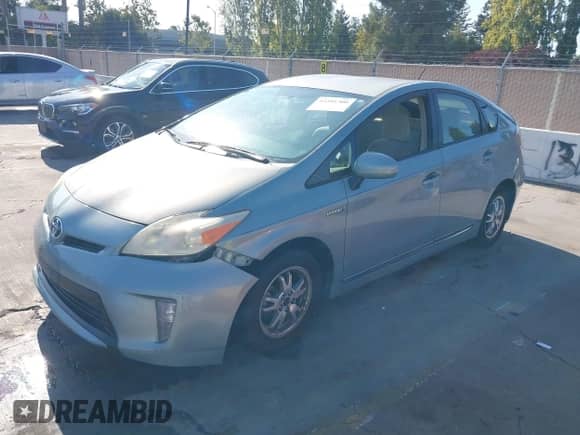 2012 Toyota Prius One with VIN JTDKN3DU2C1497804, listed as a IAAI auction lot 43281300 with 237,493 mi miles and . Bid and sale history available at DreamBid. Image 2.