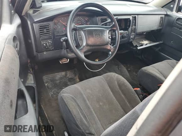2003 Dodge Dakota с VIN 1D7FL36X03S159557, выставлен на аукционе Copart как лот 85516535 с пробегом 209 972 миль миль и Списание • Salvage title. История ставок и продаж доступна на DreamBid. Изображение 8.