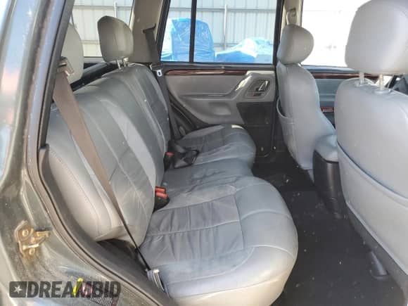 2003 Jeep Grand Cherokee Overland с VIN 1J8GW68J13C502699, выставлен на аукционе Copart как лот 89680615 с пробегом 200 013 миль миль и Чистый • Clean title. История ставок и продаж доступна на DreamBid. Изображение 11.