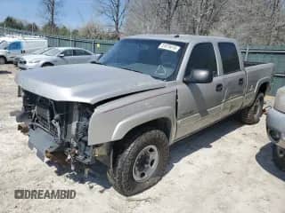 2005 Chevrolet Silverado 2500HD Work Truck with VIN 1GCHC23265F912638, listed as a Copart auction lot 51075415 with 295,291 mi miles and Salvage title. Bid and sale history available at DreamBid. Image 1.