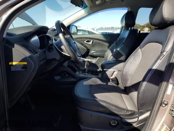 2013 Hyundai Tucson GLS z VIN KM8JUCAC0DU710190, wystawiony jako Copart lot #90093875 z przebiegiem 126 542 mil mil oraz Szkoda całkowita • Salvage title. Historia ofert i sprzedaży dostępna na DreamBid. Obrazek 7.