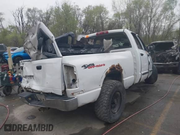 2003 Dodge 1500 ST z VIN 1D7HU18D83J601200, wystawiony jako IAAI lot #41941714 z przebiegiem Nie podano mil oraz . Historia ofert i sprzedaży dostępna na DreamBid. Obrazek 4.