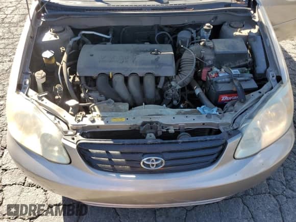 2004 Toyota Corolla CE z VIN 1NXBR32E94Z301126, wystawiony jako Copart lot #87467835 z przebiegiem 181 189 mil mil oraz Szkoda całkowita • Salvage title. Historia ofert i sprzedaży dostępna na DreamBid. Obrazek 11.