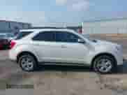 2015 Chevrolet Equinox LT z VIN 1GNALBEK9FZ105004, wystawiony jako IAAI lot #42678184 z przebiegiem 199 847 mil mil oraz . Historia ofert i sprzedaży dostępna na DreamBid. Obrazek 13.