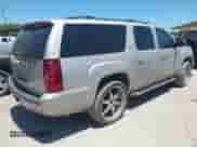 2009 Chevrolet Suburban 1LT z VIN 1GNFC26J89R169907, wystawiony jako IAAI lot #42817134 z przebiegiem 194 554 mil mil oraz . Historia ofert i sprzedaży dostępna na DreamBid. Obrazek 4.