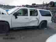 2009 Chevrolet Suburban LTZ z VIN 1GNFK36359R256609, wystawiony jako IAAI lot #42799458 z przebiegiem 146 257 mil mil oraz . Historia ofert i sprzedaży dostępna na DreamBid. Obrazek 14.