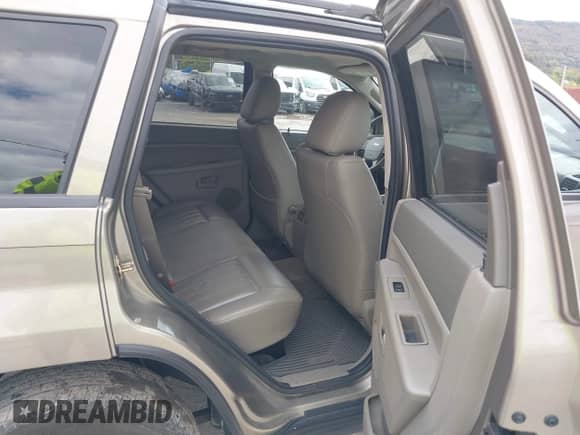 2006 Jeep Grand Cherokee Laredo z VIN 1J4GR48K26C239567, wystawiony jako IAAI lot #43428680 z przebiegiem 136 830 mil mil oraz . Historia ofert i sprzedaży dostępna na DreamBid. Obrazek 8.