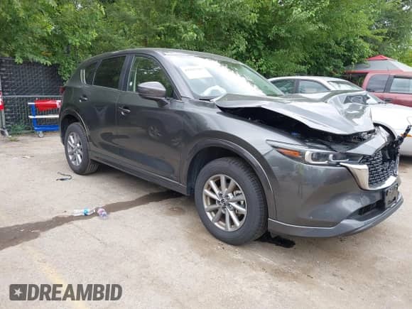 2025 Mazda CX-5 S Select z VIN JM3KFBBL6S0621120, wystawiony jako IAAI lot #42927385 z przebiegiem 13 538 mil mil oraz . Historia ofert i sprzedaży dostępna na DreamBid. Obrazek 1.