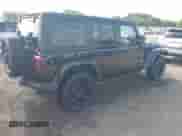 2023 Jeep Wrangler Sahara with VIN 1C4JJXP62PW628735, listed as a IAAI auction lot 42683940 with 46,534 mi miles and . Bid and sale history available at DreamBid. Image 4.