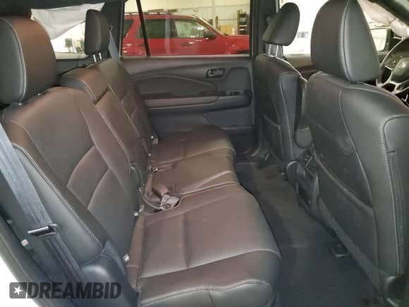 2023 Honda Passport EX-L with VIN 5FNYF8H52PB017538, listed as a Copart auction lot 68320415 with 31,933 mi miles and Salvage title. Bid and sale history available at DreamBid. Image 11.