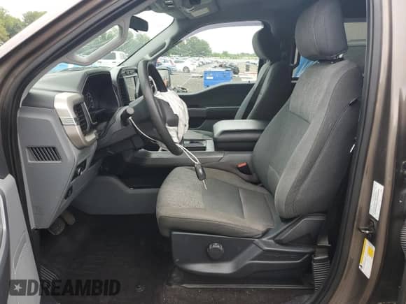 2021 Ford F-150 XL с VIN 1FTFW1E89MFA67034, выставлен на аукционе Copart как лот 68792765 с пробегом 104 756 миль миль и Списание • Salvage title. История ставок и продаж доступна на DreamBid. Изображение 7.