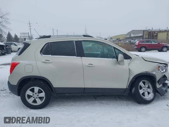 2016 Chevrolet Trax LT z VIN 3GNCJPSB4GL127243, wystawiony jako IAAI lot #41315207 z przebiegiem 110 638 mil mil oraz . Historia ofert i sprzedaży dostępna na DreamBid. Obrazek 13.