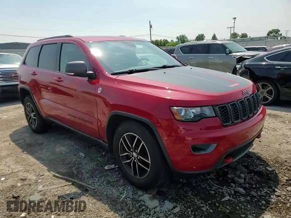 2018 Jeep Grand Cherokee Trailhawk с VIN 1C4RJFLG4JC184813, выставлен на аукционе Copart как лот 66664425 с пробегом 104 366 миль миль и Списание • Salvage title. История ставок и продаж доступна на DreamBid. Изображение 14.
