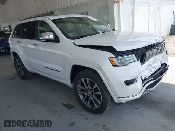2018 Jeep Grand Cherokee Overland with VIN 1C4RJFCG8JC229381, listed as a IAAI auction lot 42221266 with 102,230 mi miles and . Bid and sale history available at DreamBid. Image 1.