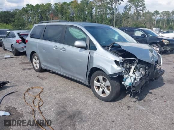 2016 Toyota Sienna LE AAS with VIN 5TDKK3DC4GS746001, listed as a IAAI auction lot 43076702 with 97,690 mi miles and . Bid and sale history available at DreamBid. Image 1.