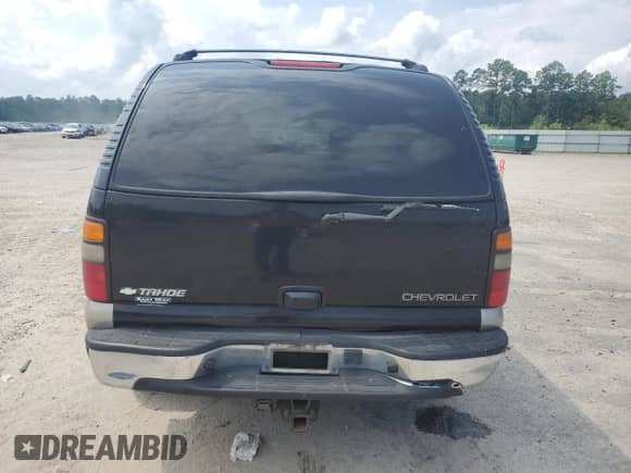 2004 Chevrolet Tahoe LT с VIN 1GNEC13Z24R207897, выставлен на аукционе Copart как лот 69445485 с пробегом 205 375 миль миль и Списание • Salvage title. История ставок и продаж доступна на DreamBid. Изображение 6.