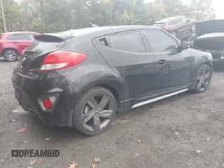 2015 Hyundai Veloster Turbo z VIN KMHTC6AE4FU226430, wystawiony jako IAAI lot #43443497 z przebiegiem 125 901 mil mil oraz . Historia ofert i sprzedaży dostępna na DreamBid. Obrazek 4.