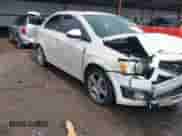 2014 Chevrolet Sonic LTZ with VIN 1G1JE5SB5E4122735, listed as a IAAI auction lot 42327595 with 163,912 mi miles and . Bid and sale history available at DreamBid. Image 1.