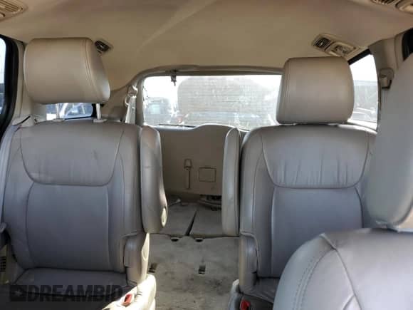 2010 Toyota Sienna XLE с VIN 5TDYK4CC1AS312935, выставлен на аукционе Copart как лот 84916835 с пробегом 147 715 миль миль и Списание • Salvage title. История ставок и продаж доступна на DreamBid. Изображение 10.