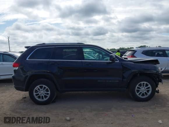 2020 Jeep Grand Cherokee Laredo E with VIN 1C4RJFAG0LC226447, listed as a IAAI auction lot 42598801 with 38,558 mi miles and . Bid and sale history available at DreamBid. Image 14.