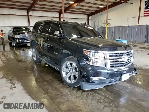 2019 Chevrolet Tahoe Premier с VIN 1GNSKCKC4KR349499, выставлен на аукционе Copart как лот 64624875 с пробегом 127 191 миль миль и Списание • Salvage title. История ставок и продаж доступна на DreamBid. Изображение 15.